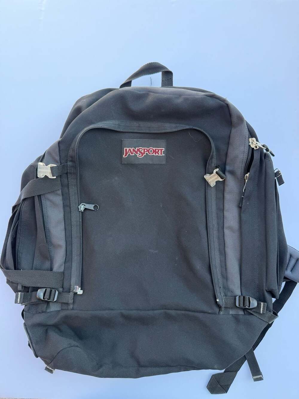 Vintage JanSport Black Backpack with Internal Frame and Multiple Compartments